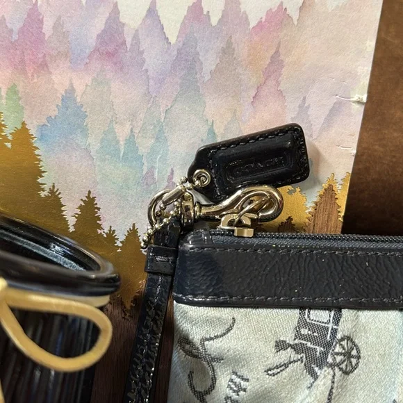 Vintage COACH perfect pre-loved condition wristlet. Two-tone blue with silver.
